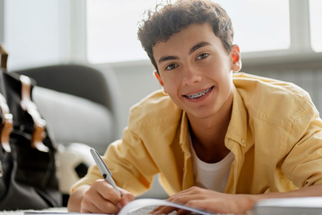 A teenage boy with braces